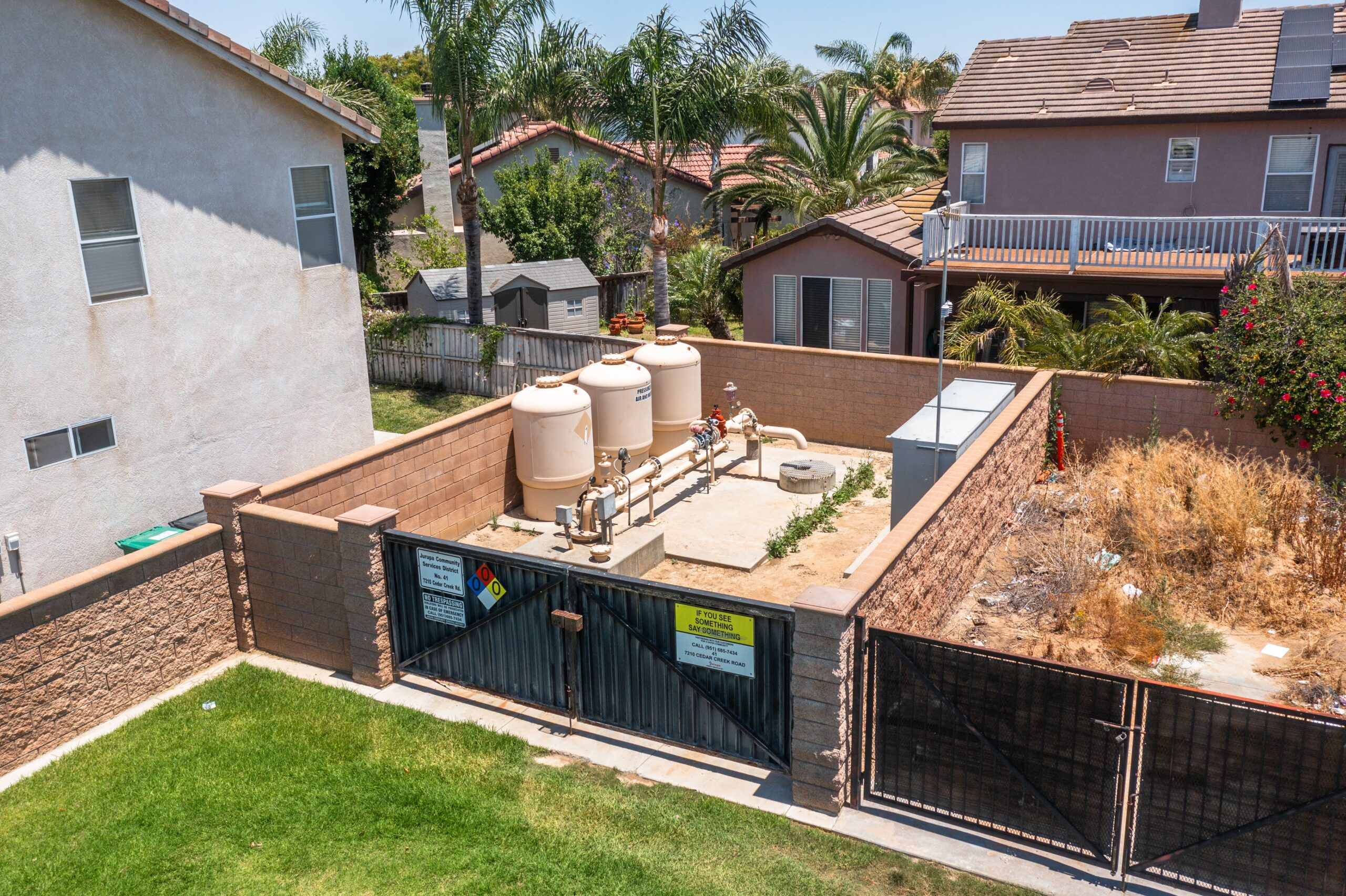 water facility behind houses