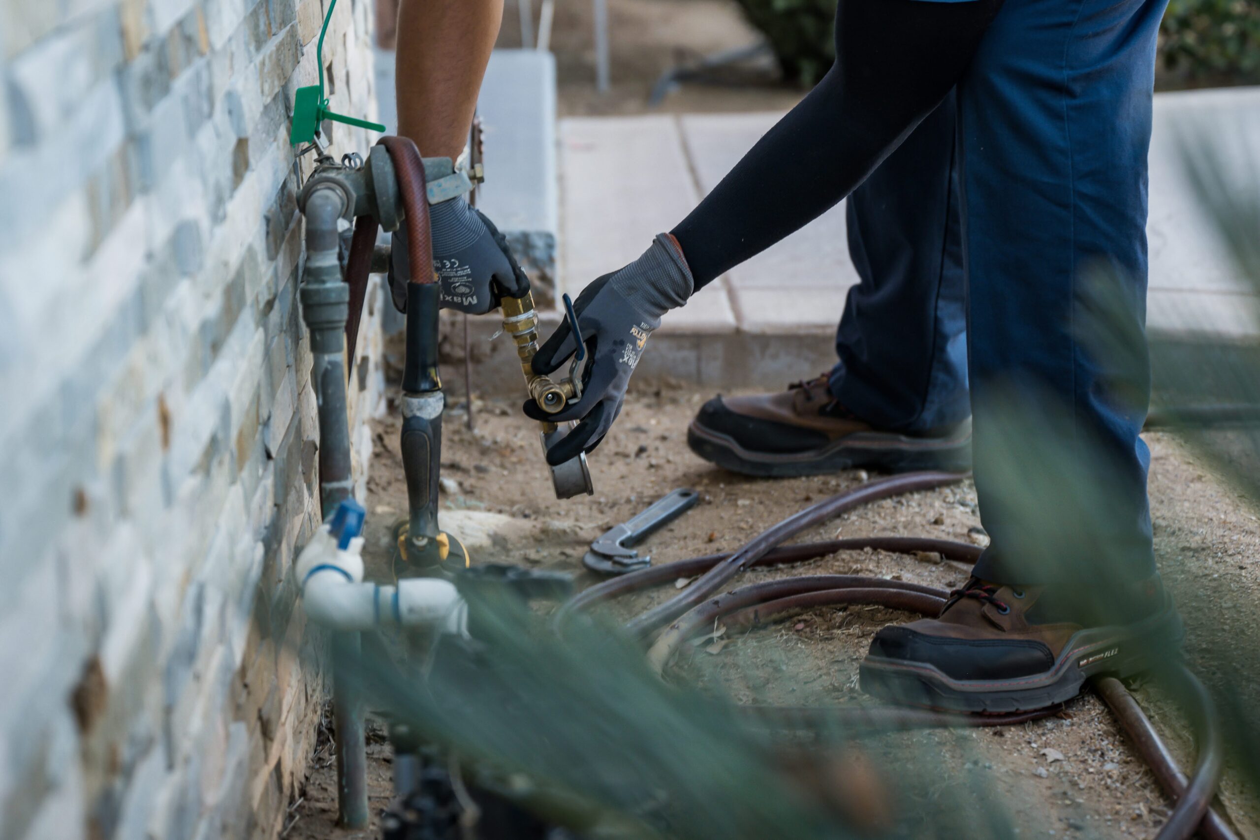 person working on hose